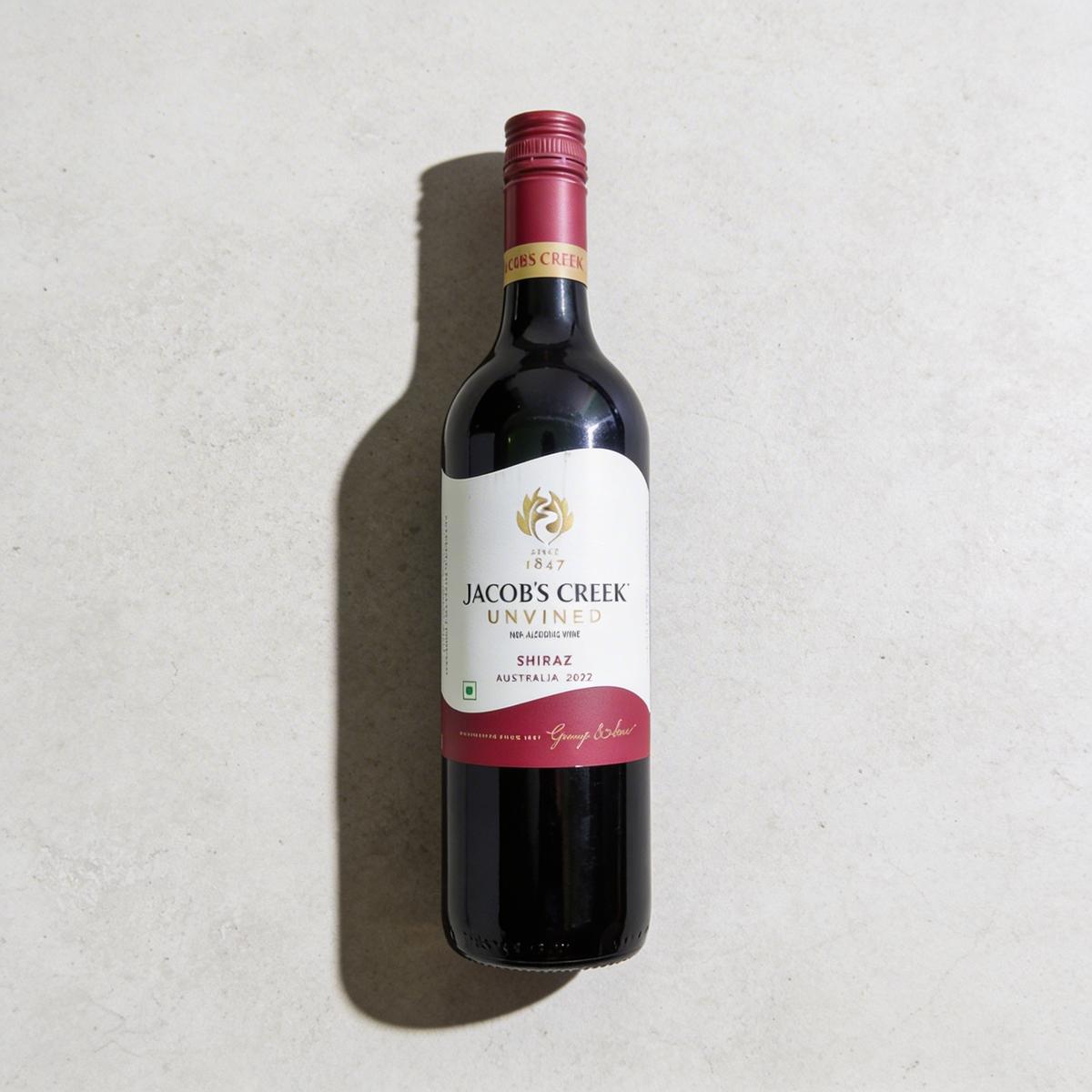 Spirits bottle with elegant glassware